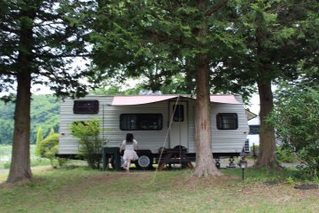 There are several different accommodation choices. We stayed in an old camper van.