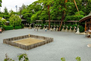 The large stone courtyard at the base of the stairs