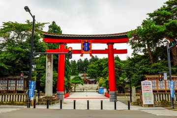The large Torii gate as seen from the entrance to the Shrine