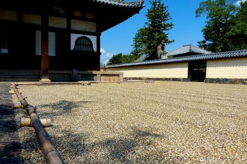 The pavement is clearly demarcated by bamboo barrier