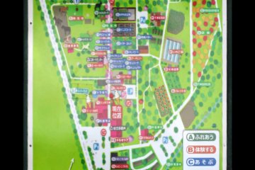 Purple dots on the map represent places you can interact with animals. Orange is for activities and blue for play areas. Pink is for relaxation, such as the hot spring. Red is for eateries and blue for shops. 