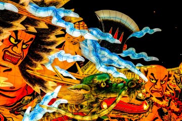Towada Lake Legend: Hachinotaro & Nansobo Monk by artist Renmei Kitamura depicts a fight over the position of Lake Towada