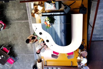Take your place around the Grand Piano Shaped Counter for a meal at Cafe Cube