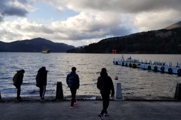 View of Lake Ashi and the tori at Hakone Shrine. Mount Fuji was hiding behind the clouds