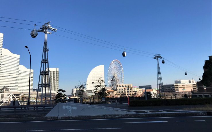 Yokohama Air Cabin with a view of Yokohama's giant Ferris wheel, Cosmo Clock 21.