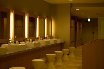 The changing room of the women's spa area is very sleek and modern