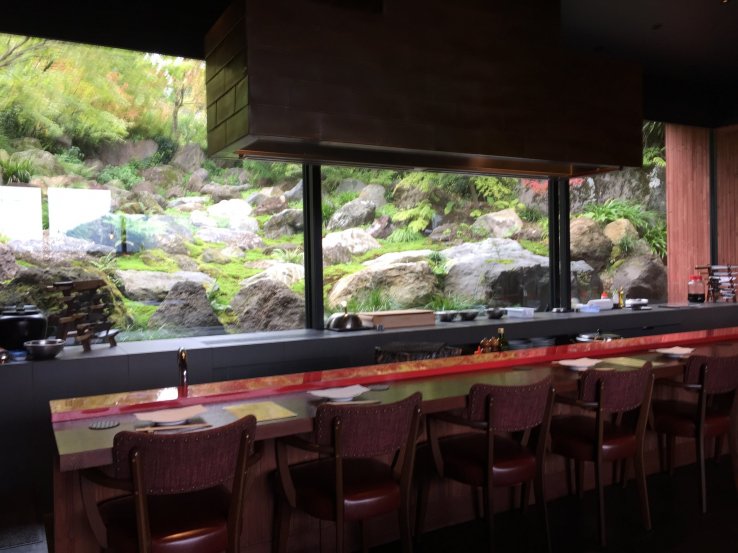 Counter seats and rock garden view through the window