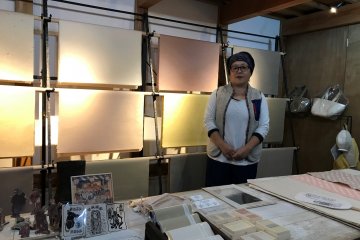 Showing her impressive collection of washi