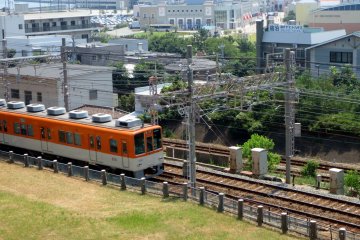 <p>The Sanyo Electric and JR lines can be seen from the tomb</p>