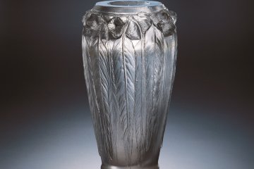 This vase is embellished with eucalyptus leaf motifs