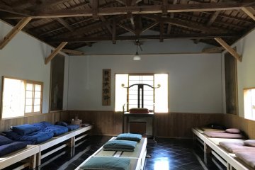 A spacious meditation hall invites you to sit in Zazen