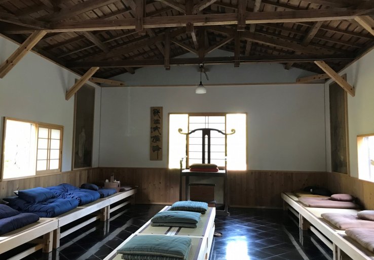 A spacious meditation hall invites you to sit in Zazen