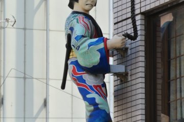 A Kabuki character on the wall