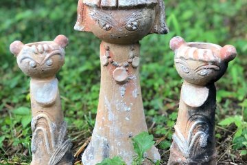 Mizuho uses an open fire technique to bake his ceramic pieces