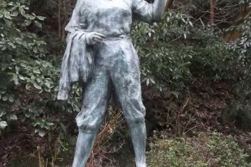 Waving to the next statue