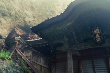 The main shrine buildings, on the left is the Honden building set in a cave