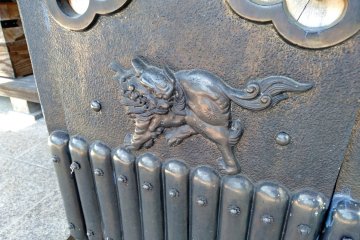A mythical kirin decorates a column of the main temple