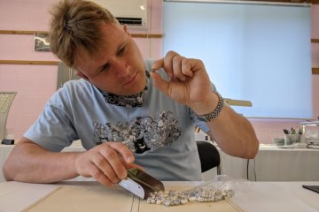 The author checking out the pearls for himself.