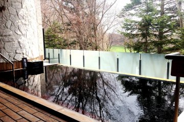 An outdoor bath is a great way to relax at Kitahiroshima Classe Hotel