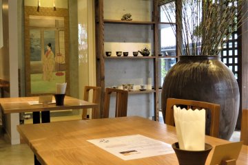 Relax in the teahouse set in natural wood and earthy hues
