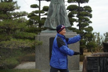 Ueshiba sensei and his young follower