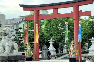 Ni-no-torii decorated with bamboo branches and streamers