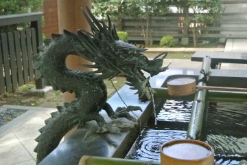Dragon statue at the water basin