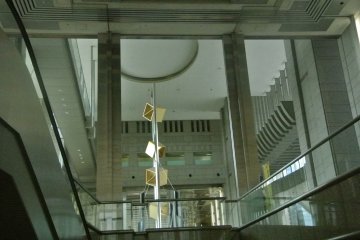 Metallic art in a soaring lobby