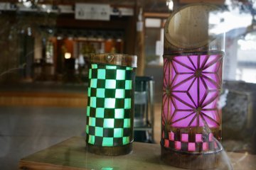 Handmade bamboo lanterns crafted by the local bamboo farmers on display at the shrine