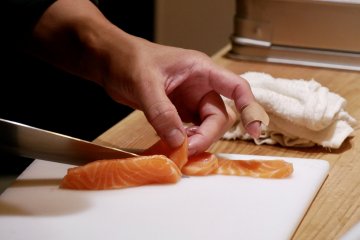Live sashimi salmon preparation 