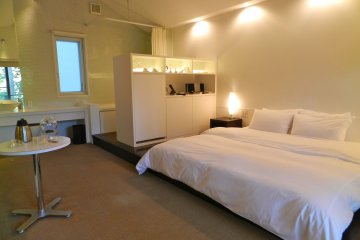 The enormous bed on a slightly raised platform in the terrace room.