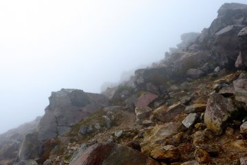 Rough rocky surface of the mountain near the summit