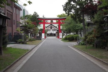 The main hall comes into view as you walk towards the gate