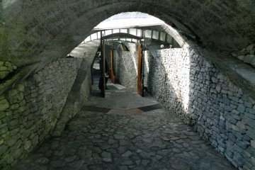 Light and stone in the entrance to the stone church.
