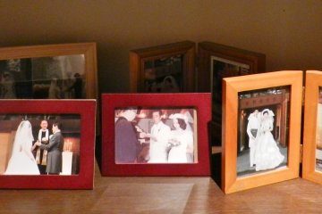 The room is also full of photos of happy couples, sometimes several generations of them, who married
