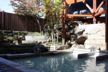 Experience Kusatsu's blue waters at the open air baths