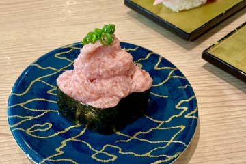 Sushi rolls overflowing with tuna