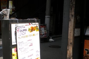 The entrance to "Trattoria Yours" near JR Yokohama Station