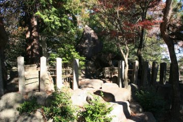 Ikeda's grave in the copse above the museum.