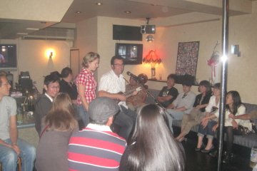 Rue playing at Open Mic Night