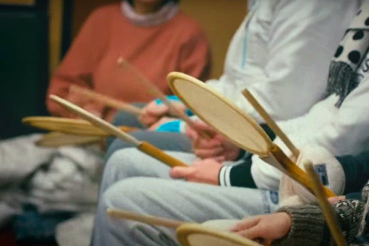 Audience playing music during Soil & 5 Grains