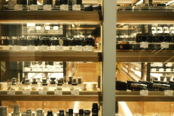 The vintage cameras and lenses are beautifully displayed