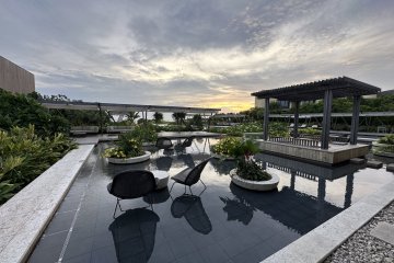 The Infinity pool has seating for lounging in the water