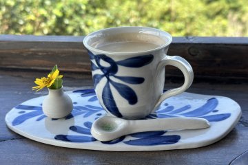 Coffee is served in handmade pottery 