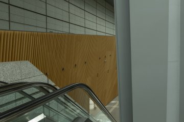 Each element of the building is a work of art. These wooden panels lined the length of the building