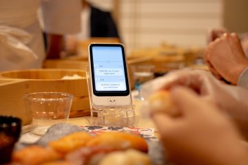 Interpretation device on each table