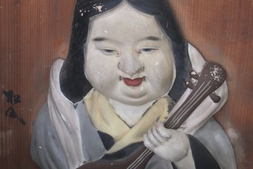 Raised carving of the Goddess of Art, Benten
