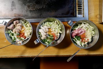 Single servings of okonomiyaki for all-you-can-eat