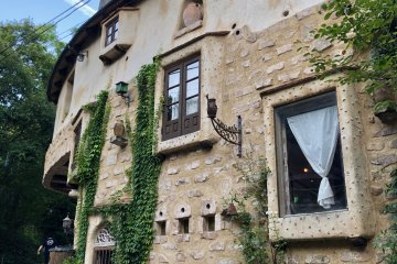 Cute little cottages with ivy climbing the walls 