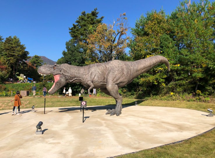 The Tyrannosaurus Monument, right by a big park with dinosaur-themed playground equipment!